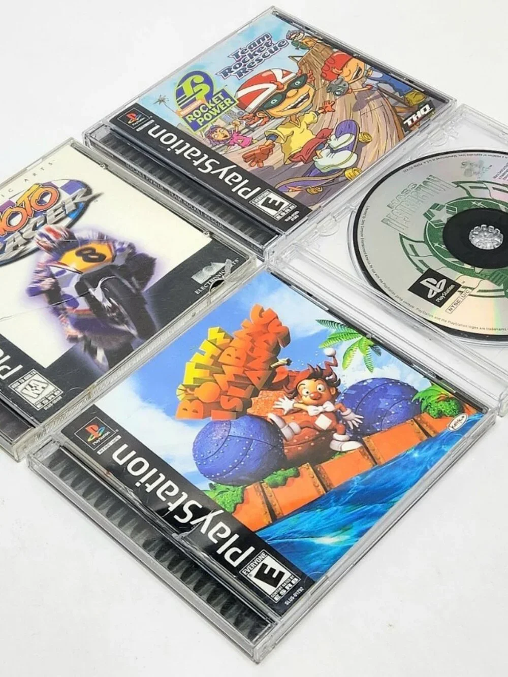 PlayStation PS1 Game Lot Bundle 4x Bombing Islands Team Rocket Rescue Moto Racer